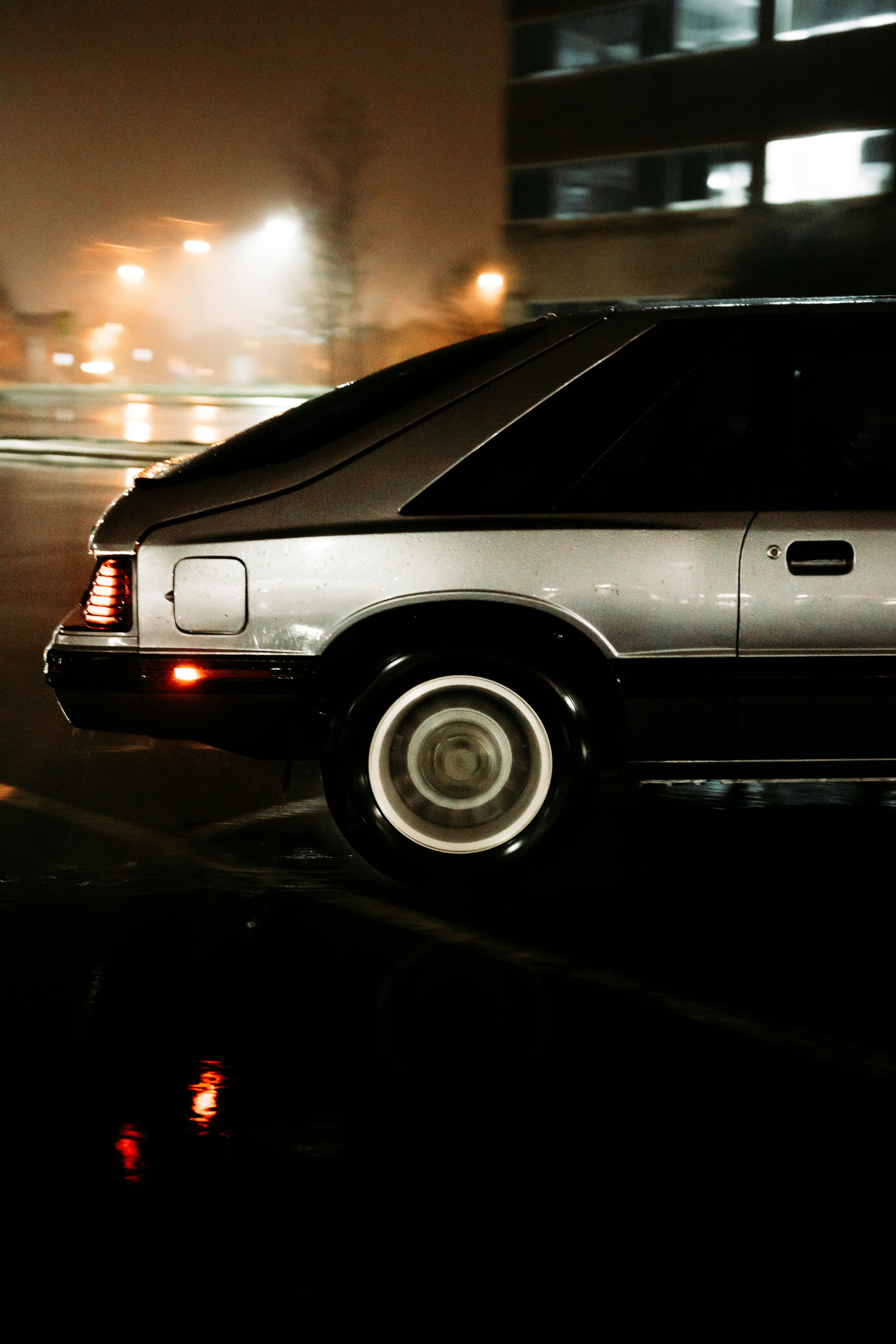 silver mercedes benz c class on road during night time